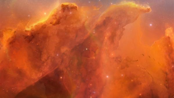 Bild 1 von 1: Gigantische Gas- und Staubwolken im All liefern das Material, aus dem neue Sterne und Galaxien entstehen.