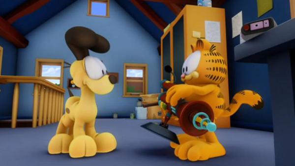 Bild 1 von 2: Der Nachbarsjunge Nathan kann mit Hilfe seiner Erfindung die Gedanken der Nachbarschaft lenken. Jon kann plötzlich keine Katzen mehr leiden.