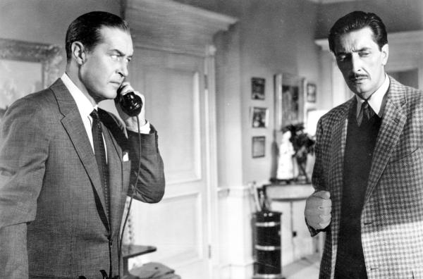 Bild 1 von 6: Tony Wendice (Ray Milland, li.) empfängt seinen früheren Cambridge-Kommilitonen, den Hochstapler Charles Swann (Anthony Dawson, re.).