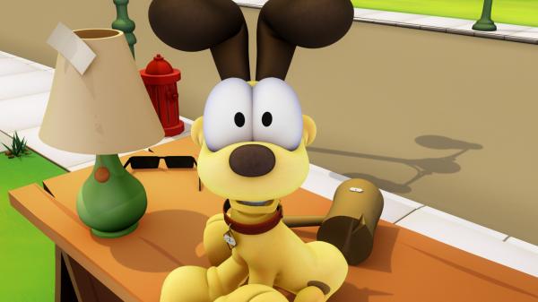 Bild 1 von 3: Garfield verkauf Odie, der ihn gerade mal wieder nervt, zu einem Spottpreis auf dem Flohmarkt.