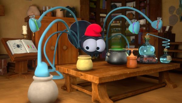 Bild 1 von 1: Der achtbeinige Papa Schlumpf versucht ein Gegenmittel für seine Verwandlung zu kreieren.