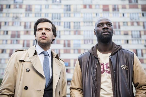 Bild 1 von 4: François Monge (Laurent Lafitte, l.); Ousmane Diakhité (Omar Sy, r.)