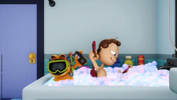 Bild 1 von 2: Jon macht es sich mit seinem Smartphone in der Badewanne gemütlich.