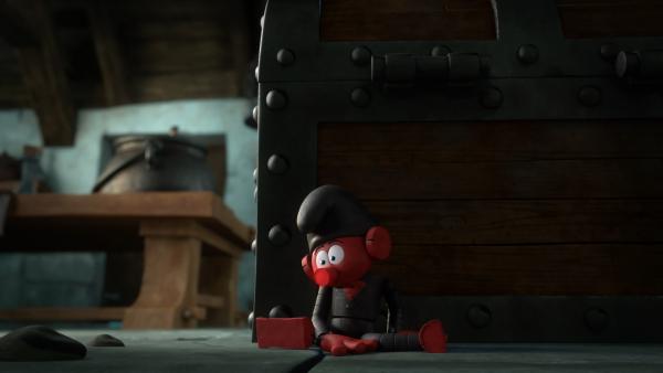 Bild 1 von 1: Um vor Gargamel sicher zu sein tut Windel-Wickler so, als sei er ein  Spielzeug.