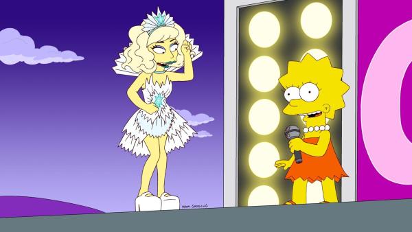 Bild 1 von 10: Sängerin Lady Gaga (l.) macht Halt in Springfield und verhilft den Einwohnern und der niedergeschmetterten Lisa (r.) zu einem stärkeren Selbstwertgefühl ...