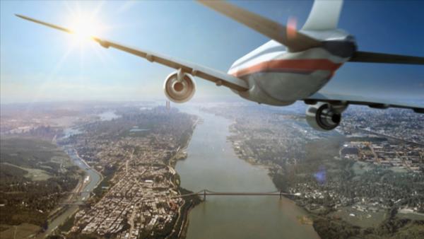 Bild 1 von 2: Animation: Ein Flugzeug rast auf die Twin Towers zu.