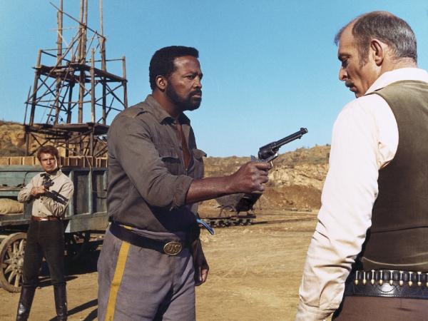 Bild 1 von 2: Billy (Lee Van Cleef, r.), Ben (Antonio Sabàto l.) und Al (Al Hoosman, M.) steuern unaufhaltsam auf eine gefährliche Konfrontation zu. Wird die Gerechtigkeit obsiegen - oder zerbricht die Freundschaft an der Habgier?