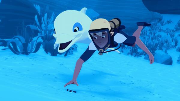 Bild 1 von 3: Yann (r.) und Zoom (l.) haben bei ihrer Unterwassersuche am Meeresboden weitere schwarze Diamanten entdeckt.
