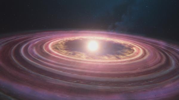 Bild 1 von 7: Vor 4,5 Milliarden Jahren entsteht unsere Sonne inmitten einer riesigen rotierenden Gas- und Staubwolke. In dieser protoplanetaren Scheibe bilden sich alle Planeten unseres Sonnensystems.