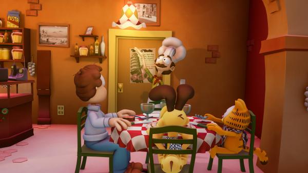 Bild 1 von 3: Garfield und Odie verkleiden sich als Jons Töchter, um in die Pizzeria zu kommen, in der Jon mit Liz zu Abend isst.
