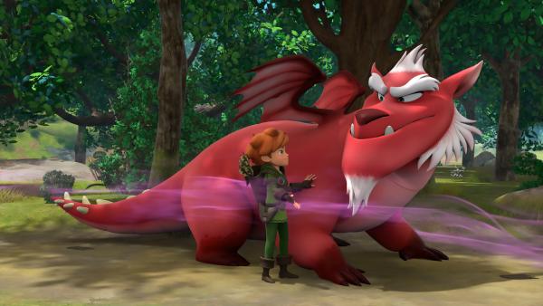 Bild 1 von 2: Drache Derke folgt dem Duft des Drachenmädchens und ist verzaubert davon. Robin warnt ihn.