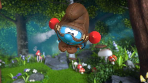 Bild 1 von 4: Handy braust mit seinem Raketenrucksack durch den Wald, um Hefty zu suchen.© KiKA/Peyo Productions, Dupuis Édition & Audiovisuell 2020 - Honorarfreie Verwendung gemäß AGB im redaktionellen Zusammenhang mit genannter Sendung bei Nennung \