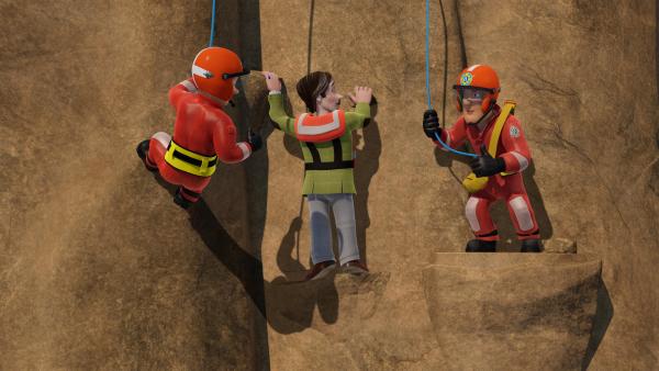 Bild 1 von 4: Ben und Sam befreien Professor Pickles aus einer misslichen Lage an der Felswand.