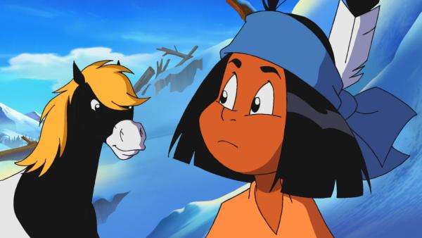 Bild 1 von 3: Yakari und Kleiner Donner entdecken große Spuren im Schnee. Gehören sie dem Sasquatch?