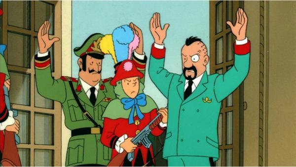 Bild 1 von 1: Tim (M.) überfällt an Karneval Oberst Sponsz (r.) und General Alvarez (l.) in Tapiocapolis, um entschlossen seinen riskanten Plan zu verfolgen.