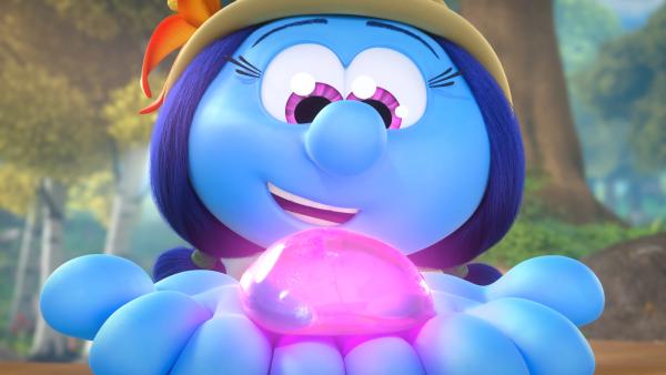 Bild 1 von 1: Lily wird von einem verzauberten Kieselstein in den Bann gezogen.© KiKA/Peyo Productions, Dupuis Édition & Audiovisuell - Honorarfreie Verwendung gemäß AGB im redaktionellen Zusammenhang mit genannter Sendung bei Nennung \