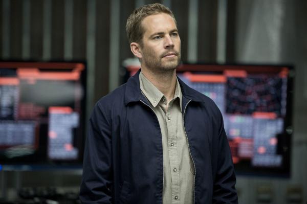 Bild 1 von 3: PAUL WALKER as Brian in Fast & Furious 6, the next installment of the global blockbuster franchise built on speed.Credit: Giles Keyte