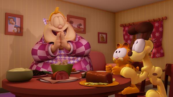 Bild 1 von 3: Garfield hungert, denn Jons Besuch scheint ähnlich viel zu verdrücken wie der Kater.