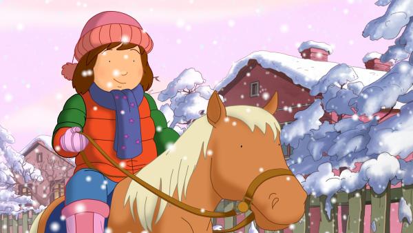 Bild 1 von 7: Laura träumt, dass sie im Winter mit einem Pony zum Kindergarten reiten kann.