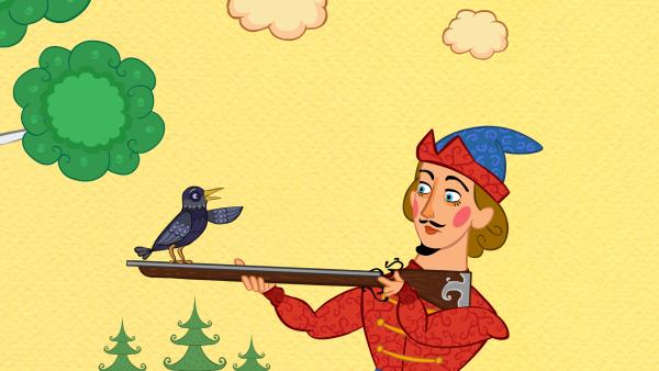 Bild 1 von 6: Der Vogel setzt sich auf das Gewehr des Dieners.