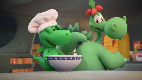 Bild 1 von 7: Wenn Grisu und sein Vater Fumé gemeinsam backen, dann kann die Torte nur lecker schmecken.© ZDF/2023 MONDO TV Group/Pagot/Calidra/T2T/ZDFS - Honorarfreie Verwendung gemäß AGB im redaktionellen Zusammenhang mit genannter Sendung bei Nennung \