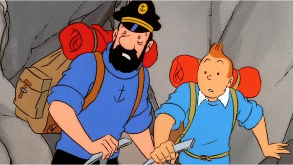 Bild 1 von 1: Tim (r.) und Kapitän Haddock (l.) suchen in den Bergen nach einem Freund, der bei einem Flugzeugabsturz ums Leben gekommen sein soll. Doch dann machen sie eine ungewöhnliche Entdeckung.