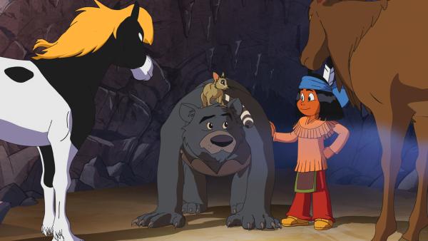 Bild 1 von 4: Ein Bär hat sich in der Salzgrotte breitgemacht. Yakari versucht ihn mit seinem Pony Kleiner Donner, dem Katzenfrett Großauge und dem Wapiti zu überreden, die Höhle aufzugeben.	© WDR/Ellipsanime Productions/Belvision/Les Cartooneurs Associés/2 Minute - Honorarfreie Verwendung gemäß AGB im redaktionellen Zusammenhang mit genannter Sendung bei Nennung \