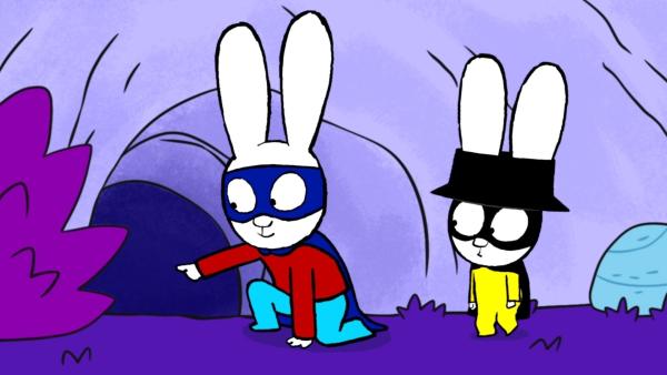 Bild 1 von 3: In einer Höhle kommen Superhase (l.) und Captain Hase (r.) dem Ursprung des Knarzens und der anderen gruseligen Geräusche auf die Spur.