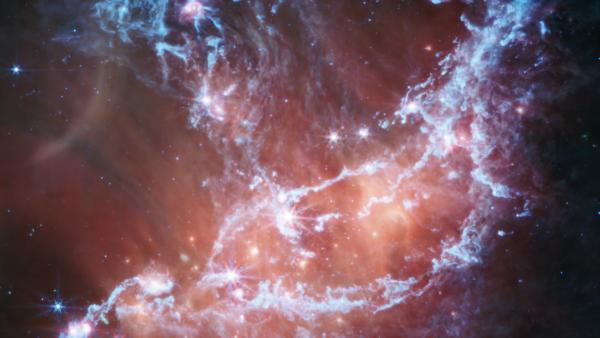 Bild 1 von 2: Das James-Webb-Teleskop hat diese spektrale Ansicht der Sternentstehungsregion NGC 346 im mittleren Infrarotlicht aufgenommen.