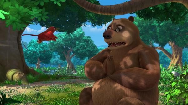 Bild 1 von 4: Balu hat sich an der Nase verletzt und wartet auf Mogli und Baghira, die medizinischen Honig holen sind. Währenddessen will sich Darsi, der kleine vergessliche Vogel, um den leidenden Bären kümmern. Doch dabei geht einiges schief.