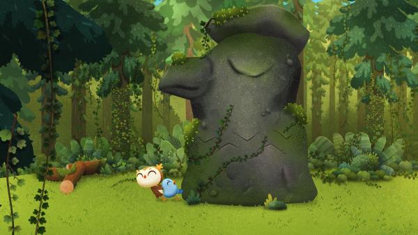 Bild 1 von 1: Im Wald, versteckt in einem Gebüsch, haben Doodle und Odo eine große Stein-Statue gefunden.© KiKA/Sixteen South & Letko - Honorarfreie Verwendung gemäß AGB im redaktionellen Zusammenhang mit genannter Sendung bei Nennung \