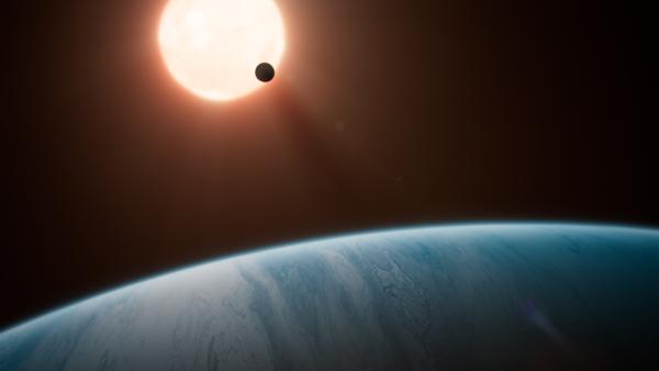 Bild 1 von 4: Die Exoplaneten Kepler 36b und 36c kommen sich so nahe, dass ihre Gravitationskräfte miteinander agieren und 36b in eine Lavawelt verwandeln.
