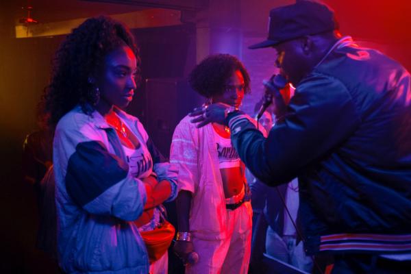 Bild 1 von 5: Normani as Entice, Dominique Thorne as Barbie, and Demario Driver as Too $hort in Freaky Tales. Photo Credit: Courtesy of Lionsgate