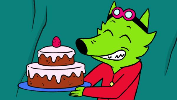 Bild 1 von 3: Professor Wolf versucht seinen Gefangenen mit Schokoladenkuchen gefügig zu machen.