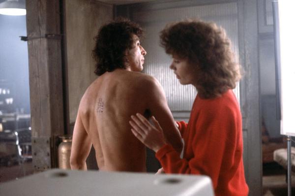 Bild 1 von 7: Seth Brundle (Jeff Goldblum, l.); Veronica Quaife (Geena Davis, r.)