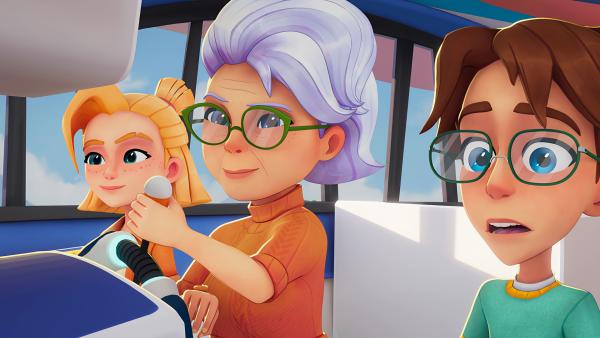 Bild 1 von 2: Oma Clara steuert selbstbewusst den Zeppelin, mit dem sie zum Adventure Club kommen wollen.© KiKA/MACK Magic/Der Kinderkanal von ARD und ZDF, 2025- Honorarfreie Verwendung gemäß AGB im redaktionellen Zusammenhang mit genannter Sendung bei Nennung \