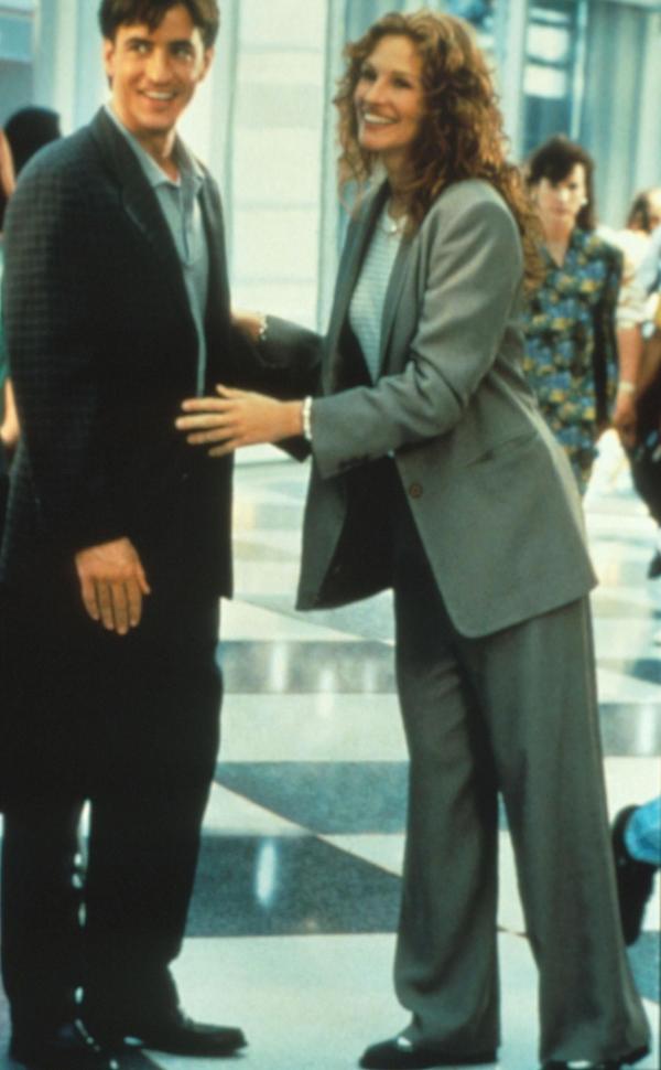 Bild 1 von 14: Scheinbar ungerührt reist Julianne (Julia Roberts, r.) zu der Hochzeit ihrer verflossenen Liebe Michael (Dermont Mulroney, l.). Doch insgeheim schmiedet sie eifrig Pläne, diese zu verhindern ...