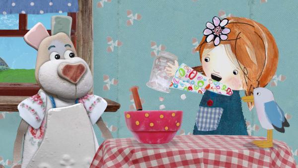 Bild 1 von 4: Lily mischt gerne Marshmallows in den Teig. Nonna gefällt das gar nicht.© KiKA/Sixteen South - Honorarfreie Verwendung gemäß AGB im redaktionellen Zusammenhang mit genannter Sendung bei Nennung \