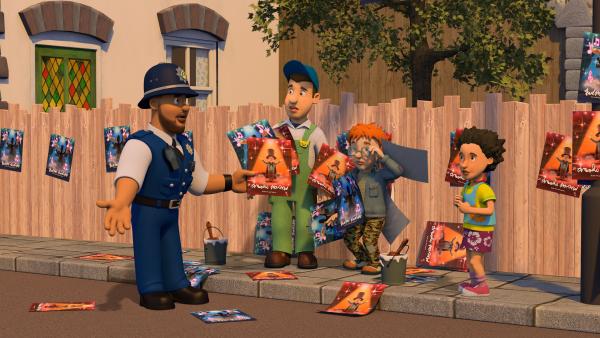 Bild 1 von 3: Norman und Mike überbieten sich im Aufhängen von Plakaten für ihre Shows. Polizist Malcolm und Mandy versuchen zu schlichten.