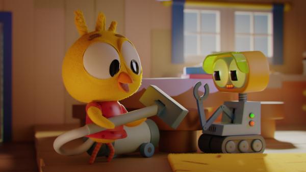 Bild 1 von 3: Karla (l.) ist begeistert, dass Robbie (r.) für sie alle Aufgaben im Haushalt übernimmt. Als Nächstes steht Staubsaugen an.