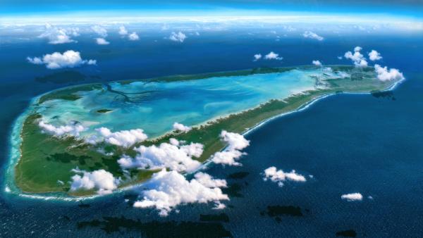 Bild 1 von 13: Vor 20 Millionen Jahren war Aldabra eine Insel mit einem Vulkan im Zentrum. Im Laufe der Zeit ist der Vulkan im Meer versunken und hat eine Lagune mit Korallenriff geformt. Der schwindende Inselrest ist heute die Heimat der Aldabra Riesenschildkröte.
