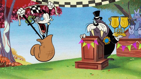 Bild 1 von 3: Micky nimmt an einem Drei-Bein-Rennen teil und gewinnt es, ohne zu schummeln.