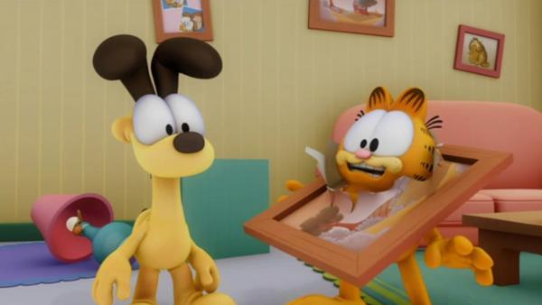 Bild 1 von 2: Garfield fürchtet sich vor dem Nachbarsjungen Nathan, der sich in einen Geist verwandelt hat.
