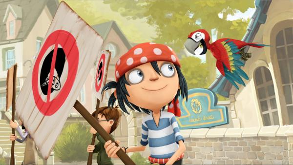 Bild 1 von 3: Jim und die anderen Kinder demonstrieren gegen Frau Biber.