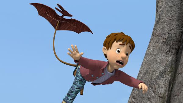Bild 1 von 3: Norman hat seinem Cousin Derek einen Streich gespielt. Dass Derek an einem Pterodactylus-Drachen davonfliegt, hat er aber nicht geplant.