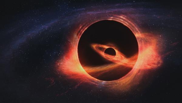 Bild 1 von 3: Supermassive Schwarze Löcher verschlingen Sterne und bestimmen die Form von Galaxien. Auch im Zentrum der Milchstraße befindet sich eines.