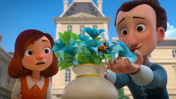 Bild 1 von 2: Henris (r.) einmalige blaue Lilie ist in Gefahr. Der Alchimist am Hofe will ein gefährliches Elixier daraus herstellen.