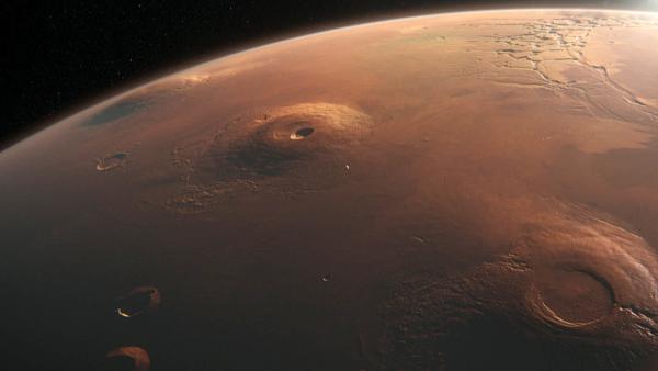 Bild 1 von 4: Auf unserem Nachbarplaneten Mars befinden sich die größten Vulkane im Sonnensystem. Sie spielen eine große Rolle in seiner Entstehungsgeschichte, sind heute jedoch erloschen.