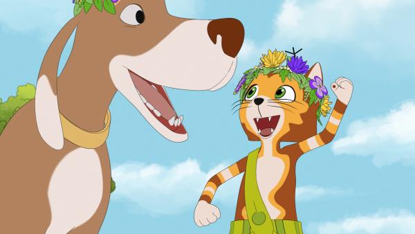 Bild 1 von 4: Findus und Harpo tanzen fröhlich um den Mittsommerbaum. Das hält den kleinen Kater wach und erhöht die Chance, dass er seine Wette gegen die Hühner gewinnt.