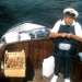 Drei Mann in einem Boot